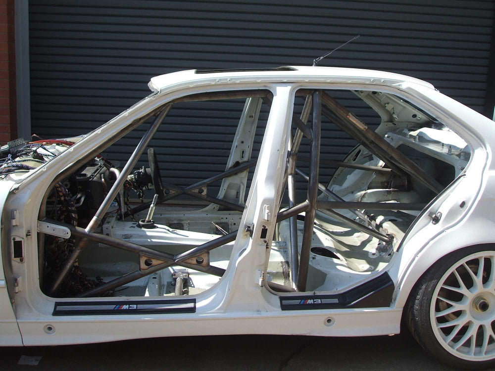 BMW E36 4dr Step 2 International Multipoint T45 roll cage kit. FIA Certificated