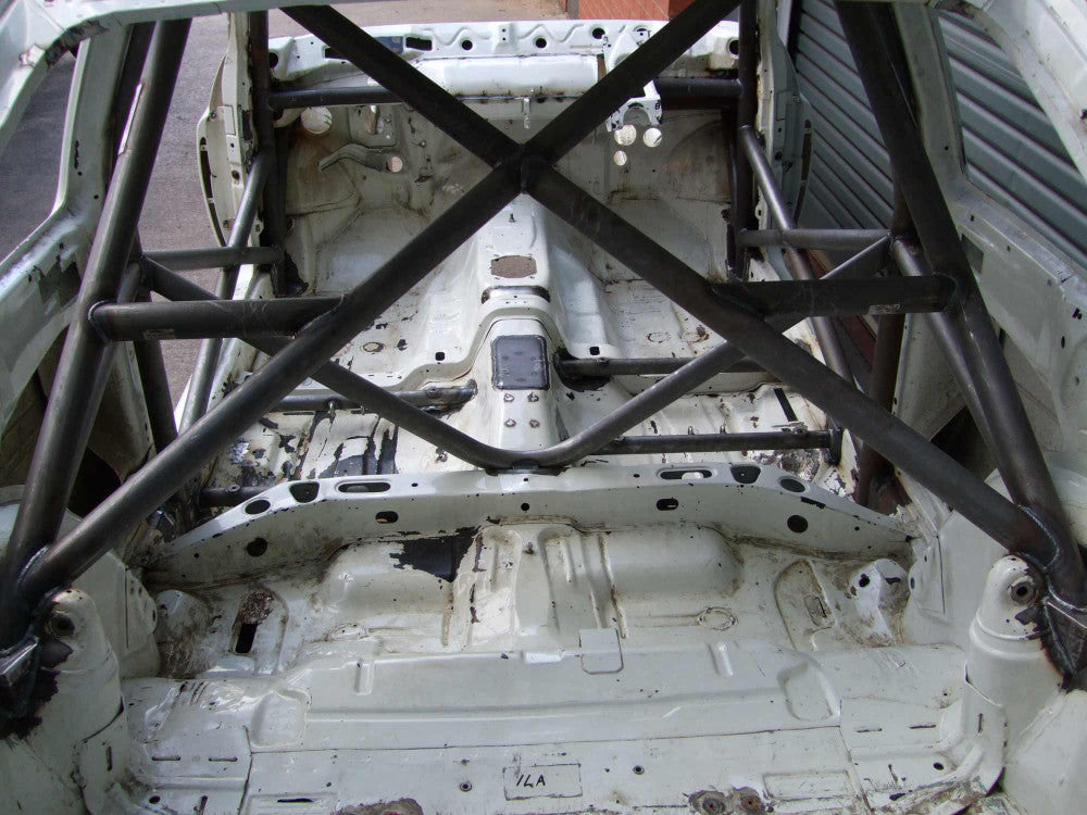 kit de jaula de seguridad multipunto T45 FORD Escort Cosworth Internacional. Certificado por la FIA