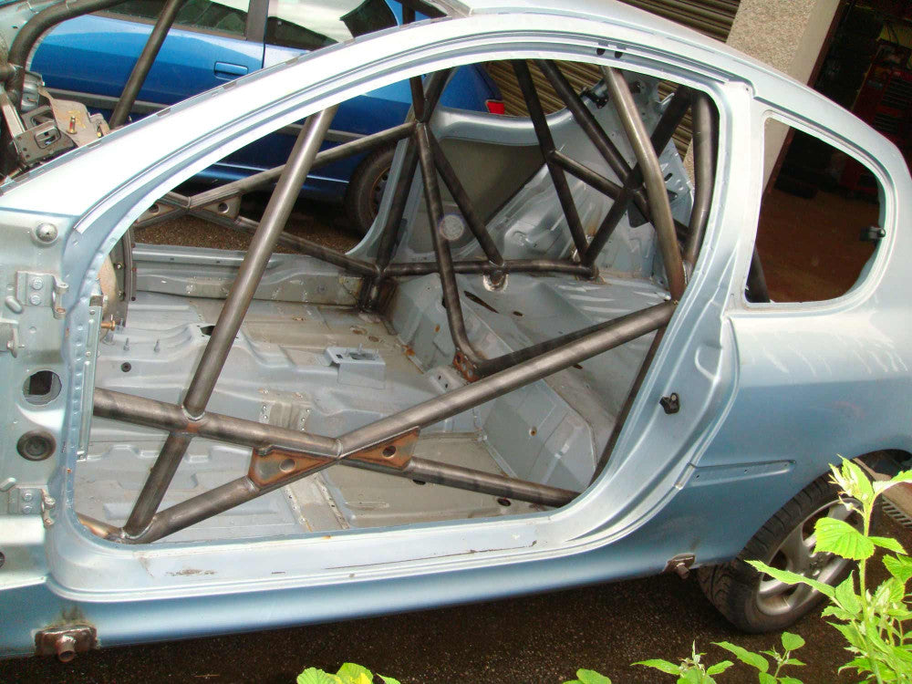 Kit de jaula de seguridad multipunto T45 para PEUGEOT 206 Internacional. Certificado por FIA / MSUK